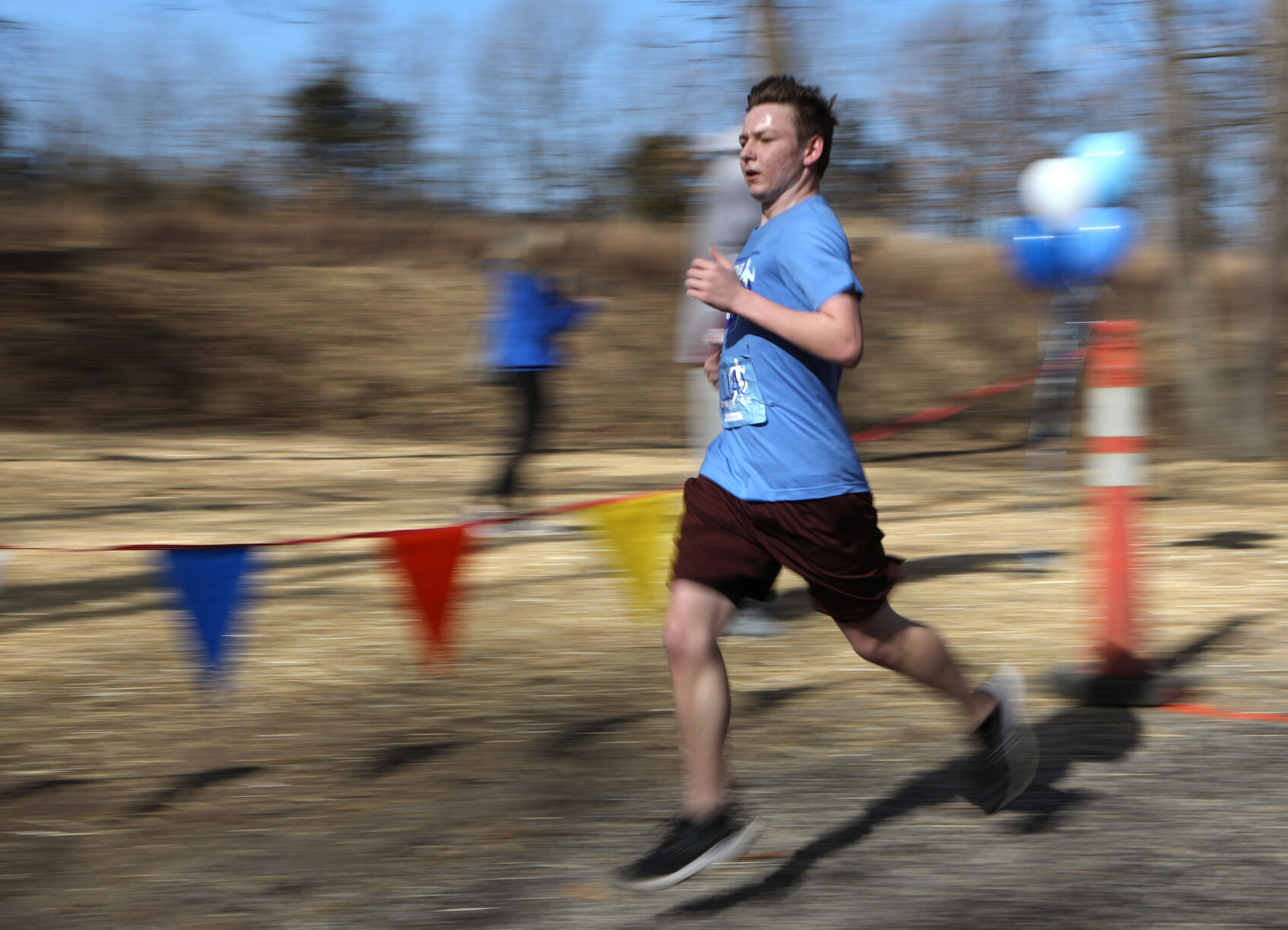 Charlie Schutt finishes a 5K